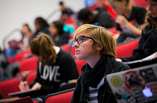 Student in a Rutgers-New Brunswick lecture hall 